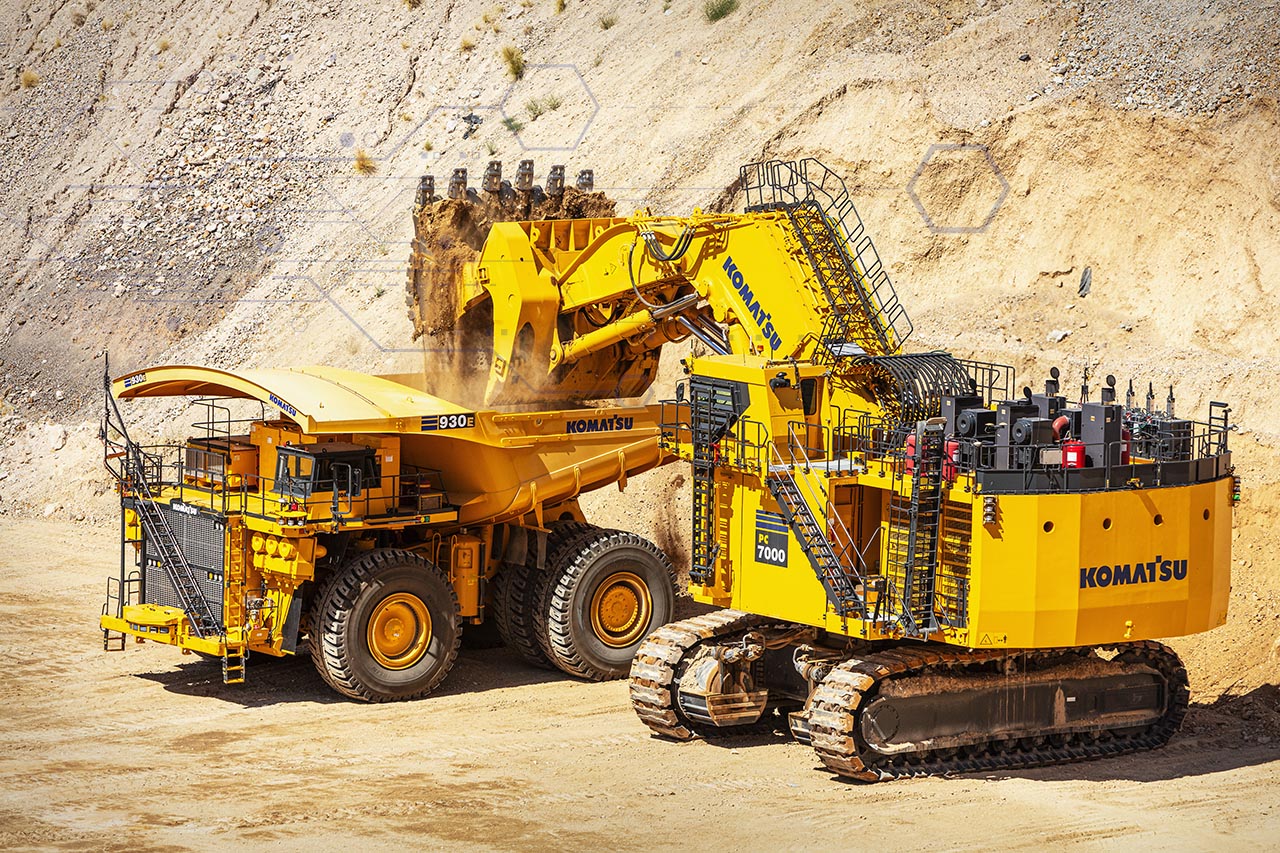 PC7000 surface mining excavator loading 930E electric drive mining truck