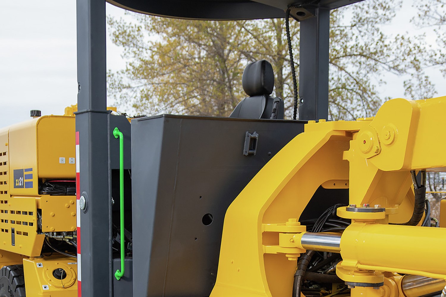 ROPS/FOPS-certified operator enclosure