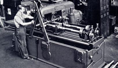 A machinist working on a spline in the 1930s at the P&H machine shop