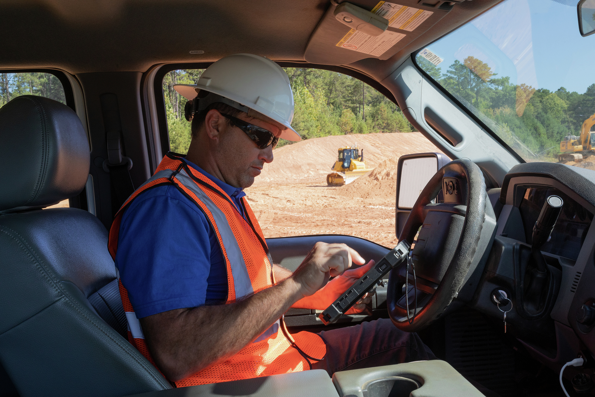 Man using tablet at job site